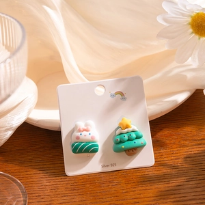 Detailed view of S925 silver Christmas earrings featuring a cute rabbit and tree