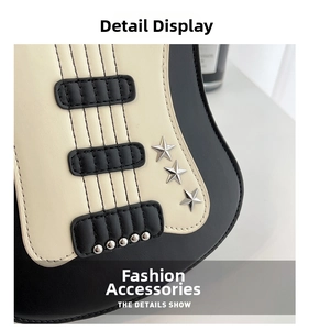 Close-up of guitar-shaped leather bag featuring silver star rivets and contrast stitching