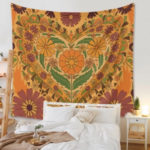 Bohemian floral heart tapestry in vintage orange and yellow tones for wall decor