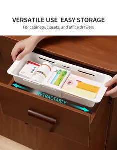 Adjustable white plastic divider for kitchen drawers and cabinet organization