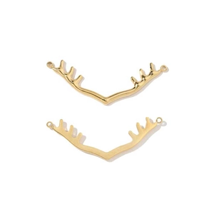 Detail of two gold wave-shaped stainless steel charms with small V-shaped protrusions