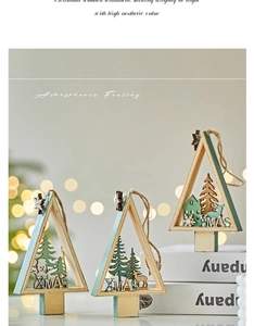 Detailed laser-cut wooden Christmas tree ornaments with snowman and elk carvings