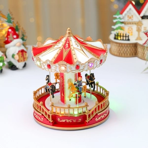 Macro detail of Christmas carousel with LED lights and festive golden relief patterns