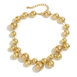 Gold oversized round bead choker necklace with metallic finish and adjustable chain