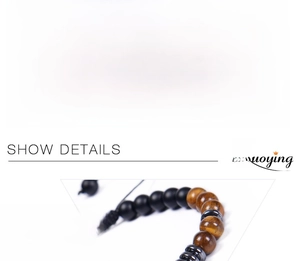 Detail of Morse code natural stone bracelet with 6mm yellow tiger eye and hematite beads