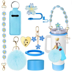 Blue accessories set for Stanley tumbler including straw cover, fur pom and silicone sleeve