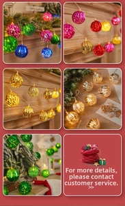 Detail of colorful LED globe string lights on a Christmas tree and festive fireplace