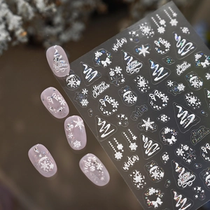 3D embossed Christmas nail stickers featuring white snowflakes and trees with laser glitter