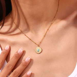 Gold 18K plated stainless steel necklace with hammered turquoise pendant on a bead chain