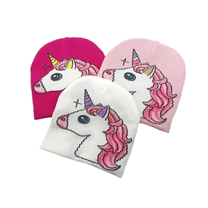 Kids knitted unicorn beanies in rose, pink and white with jacquard cartoon patterns