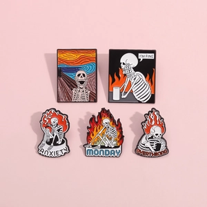 Set of five skull enamel pins with artistic designs and fun text for jackets