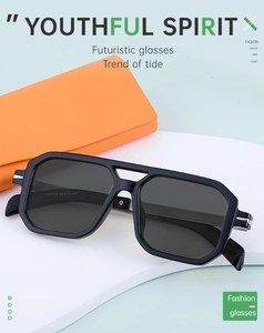 Close-up of black square frame polarized sunglasses on a geometric display stand