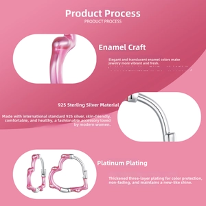 Detail of S925 sterling silver heart earrings with pink drip oil and platinum plating