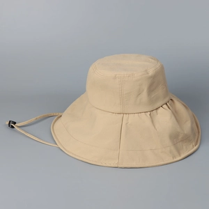 Detail of khaki wide brim sun hat showing adjustable windproof strap and buckle