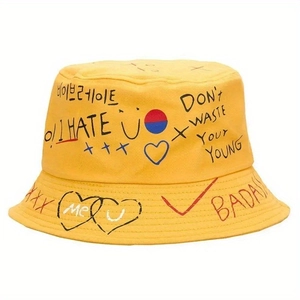 Yellow graffiti bucket hat with street style hand-drawn letters and sun protection