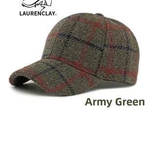 Detail of army green plaid texture and classic stitching on the wool blend baseball cap