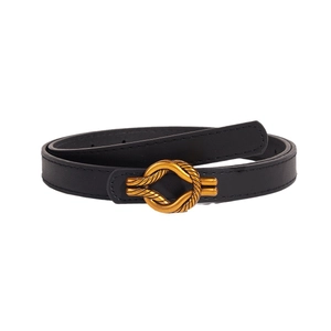 Minimalist black leather belt with a gold knot-shaped buckle on a clean white background