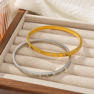 Elegance starburst stainless steel bracelets with crystals in a soft gift box display