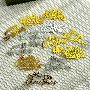 14-piece set of gold and silver acrylic Merry Christmas cake toppers with festive patterns