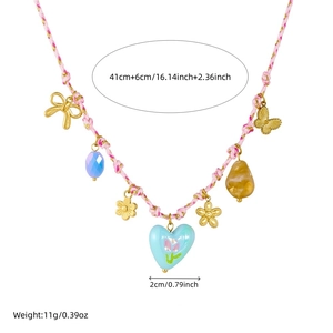 Pink woven rope necklace with floral and heart pendants, 41cm length and 11g weight