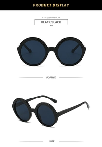 Front and side views of stylish black round sunglasses with matching frames and lenses