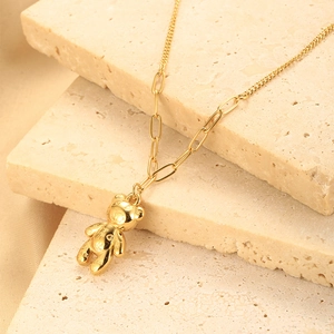 Golden 3D bear pendant necklace with artistic textured pattern and mixed link chain