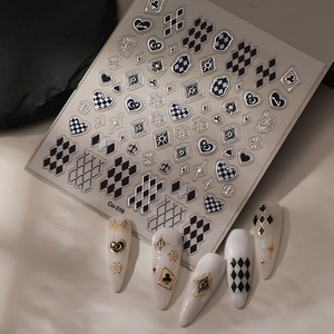Detail of Co-316 3D embossed nail stickers with checkerboard and heart patterns