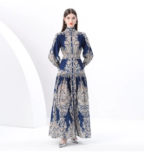 Full-length view of vintage blue paisley print dress with stand collar and button details