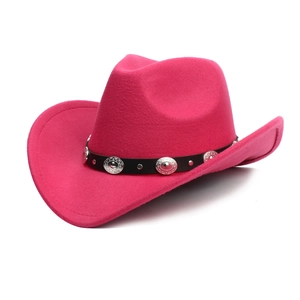 Detailed view of pink western cowboy hat featuring silver metal studs on a black band