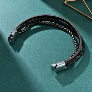 Men's multi-layer leather and steel chain bracelet with silver magnetic clasp on green