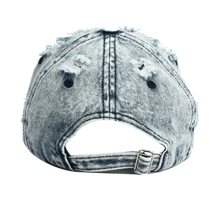 Detail of adjustable metal buckle and distressed ripped denim on vintage baseball cap