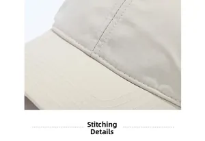 Macro shot of precise stitching details on a beige quick-dry baseball cap brim
