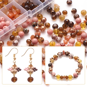 Detailed view of brown and pink glass beads with DIY jewelry samples of earrings and bracelet