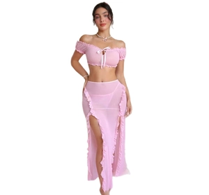 Pink sheer mesh two-piece set featuring off-shoulder top and high slit skirt with ruffles