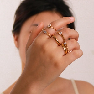 Luxury 18K gold plated stainless steel rings set with clear crystals for women