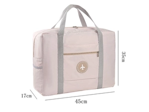 Detail of light pink large capacity travel bag showing 45x17x35cm dimensions and logo