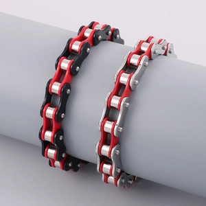 Detailed view of red and black industrial bicycle chain bracelets on display