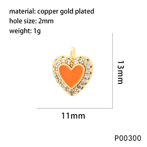 Macro shot of orange enamel heart charm with white zircon border and dimensions