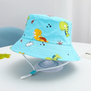 Close-up of light blue kids sun hat with dinosaur prints and adjustable windproof rope