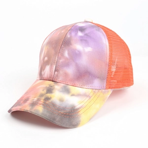 Detailed side view of tie-dye ponytail baseball cap with breathable orange mesh back