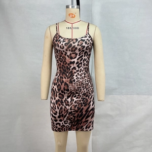 Close-up of sexy leopard print mini dress featuring slim fit and thin shoulder straps