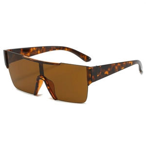 Fashionable rimless oversized tortoiseshell sunglasses with brown integrated lenses