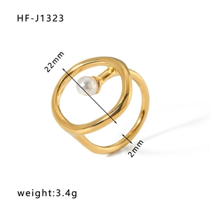 Détails d'une bague double dorée avec perle montrant le diamètre 22mm et le poids 3,4g