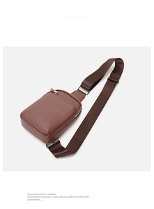 Close-up of brown lychee texture leather cross-body bag with adjustable strap
