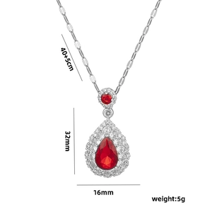 Detail shot of silver pear-shaped red zircon necklace with bamboo chain and dimensions