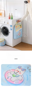 Detail of the blue honeycomb mesh laundry bag with cute bear print and sturdy handles