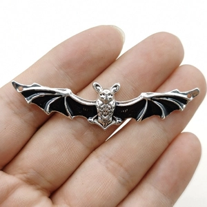 Vintage silver bat pendant for DIY jewelry with black enamel detail on wings