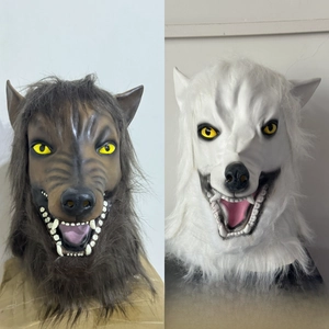 Detail of brown and white werewolf masks with realistic fur and fierce teeth for Halloween