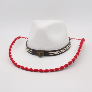 Detail of white felt cowboy hat featuring red woven brim edges and bronze bull head emblem
