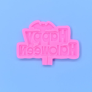 Pink silicone mold with Happy Halloween text and bat design for DIY baking cake toppers